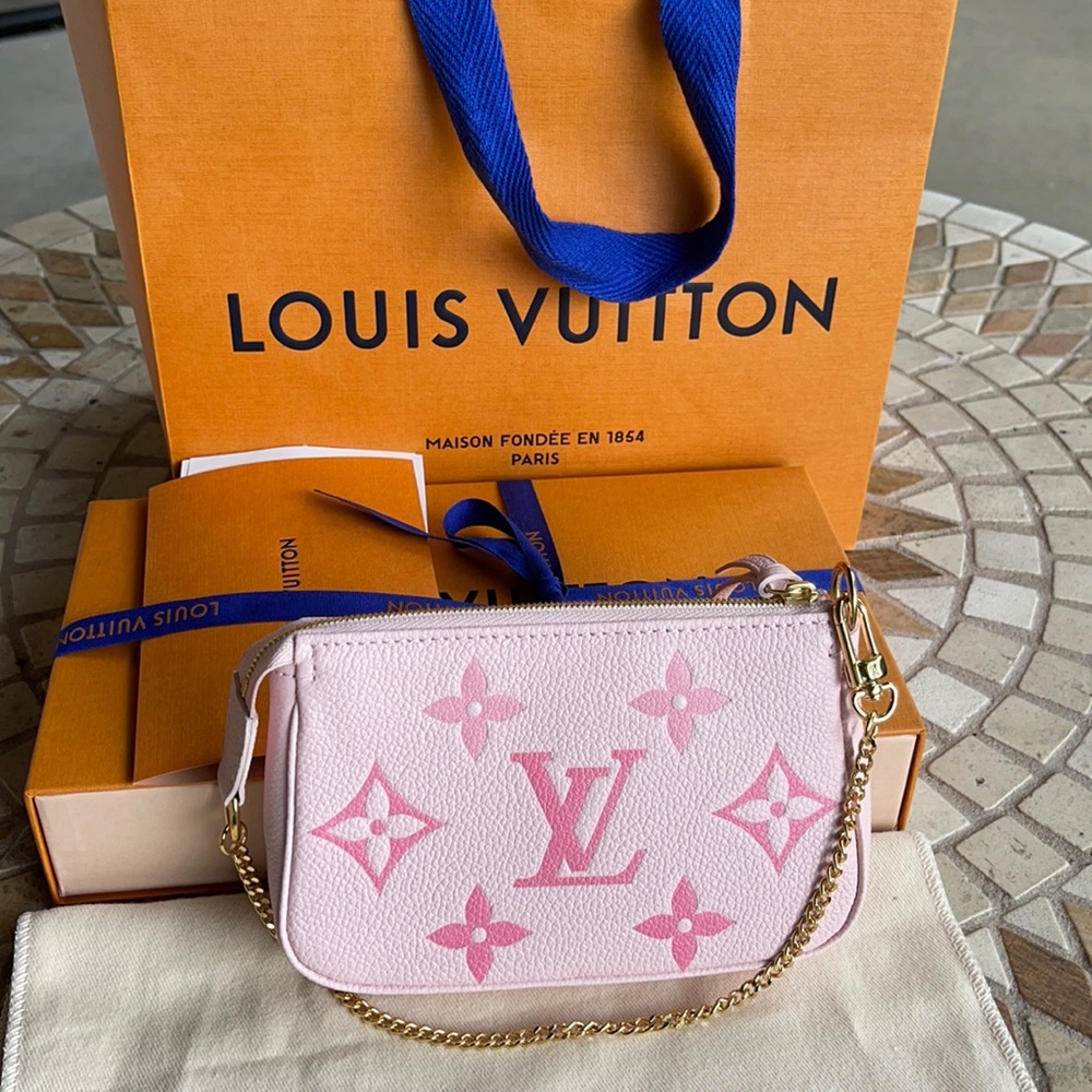 SOLD!!! Authentic Louis Vuitton Mini Pochette